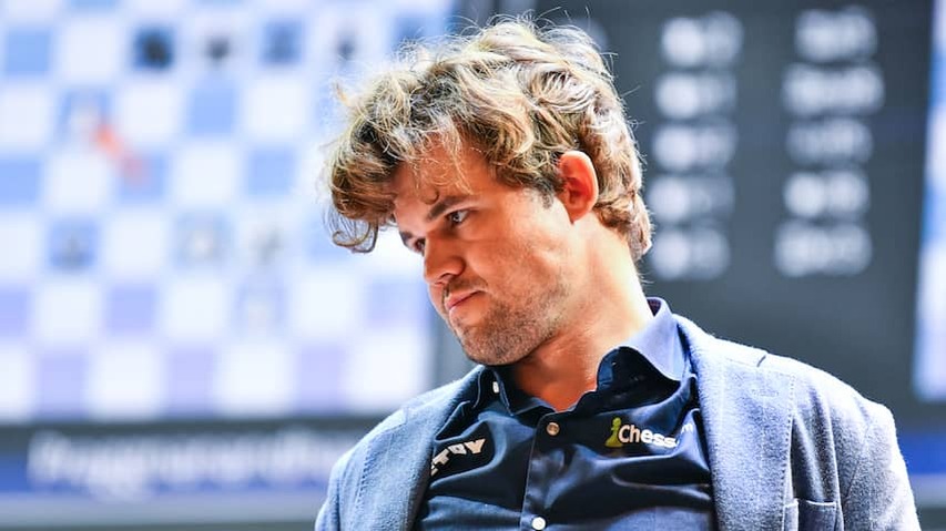 Top chess Magnus Carlsen crushes record at a draw against 143,000 players