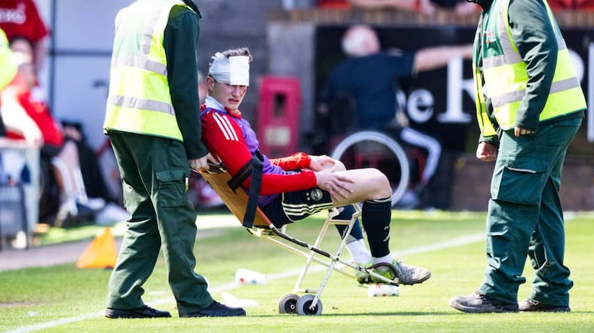 Aberdeen player Mackenzie injured by his own fan who throws a chair