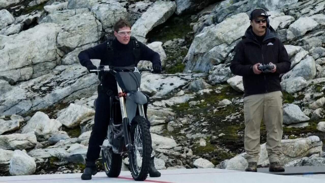 Image from Video: Cruise Jumps Off Cliff with Motorcycle for Mission: Impossible - Dead Reckoning.