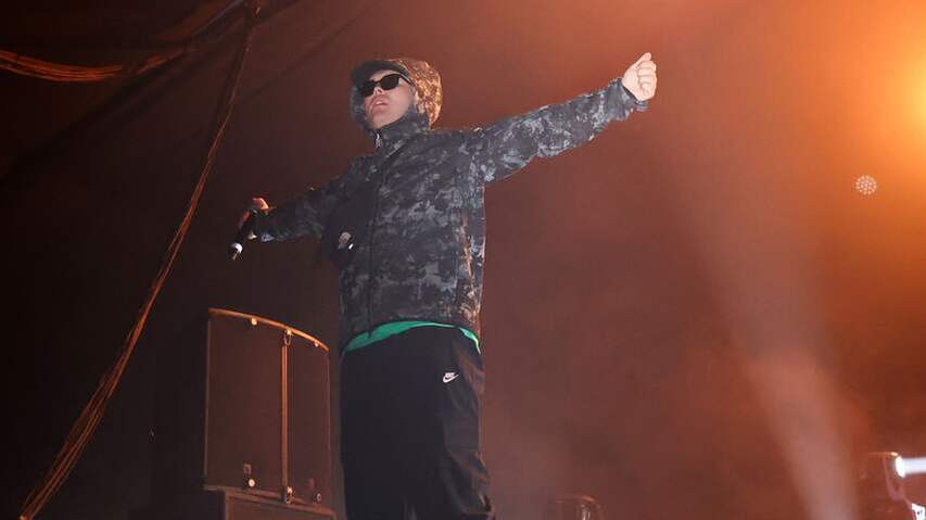 Terrorism complaint against member Irish rap group Kneecap for show Hezbollah-Flag