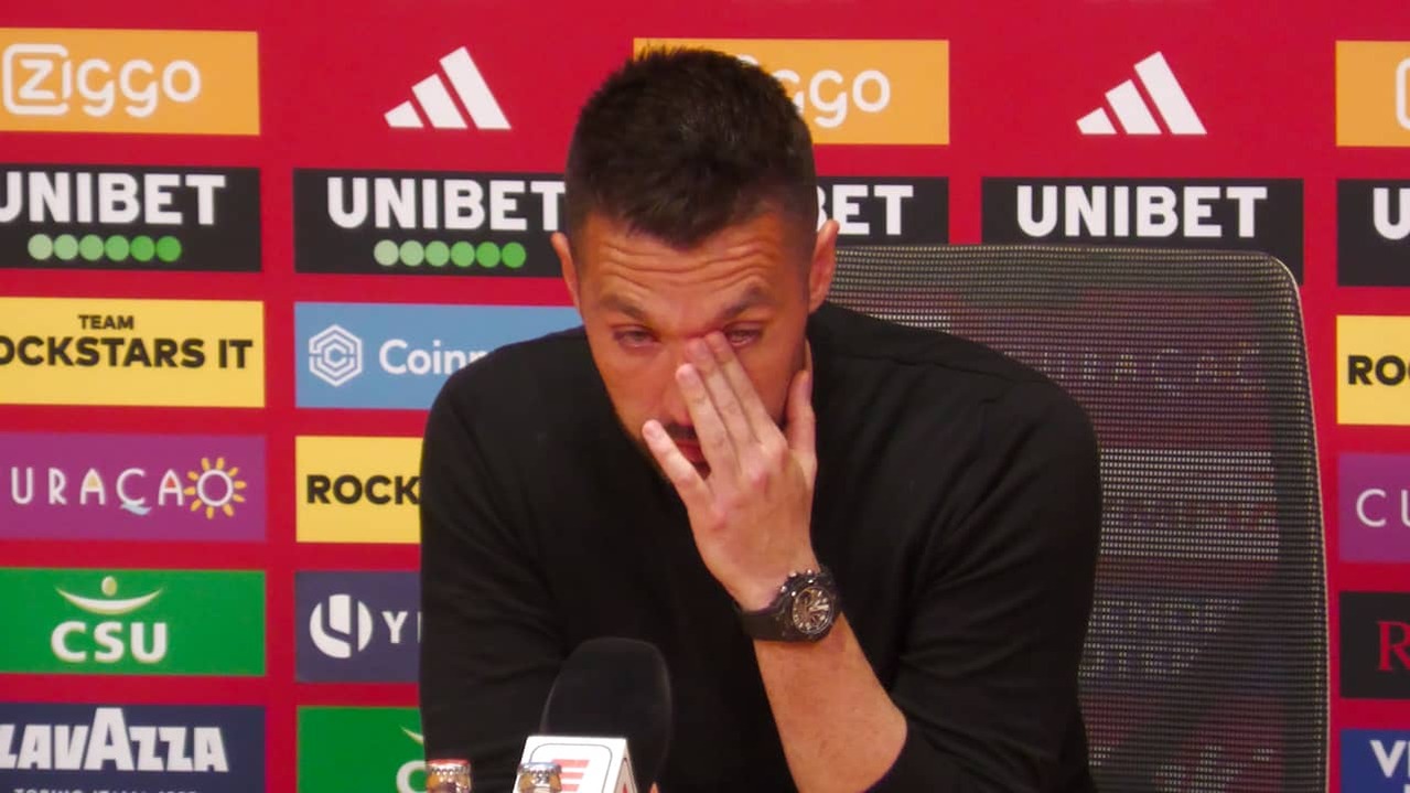 Image from video: Faroli emotionally after missing title: 'Sometimes giving is not enough'