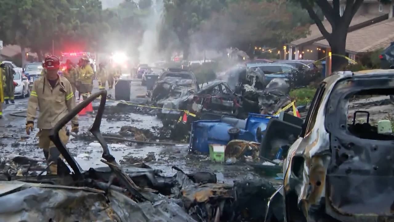 Image from video: American residential area in ruins by plane crash
