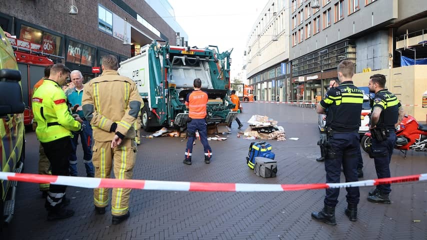 Man falls into garbage truck as a container in which he sleeps is emptied