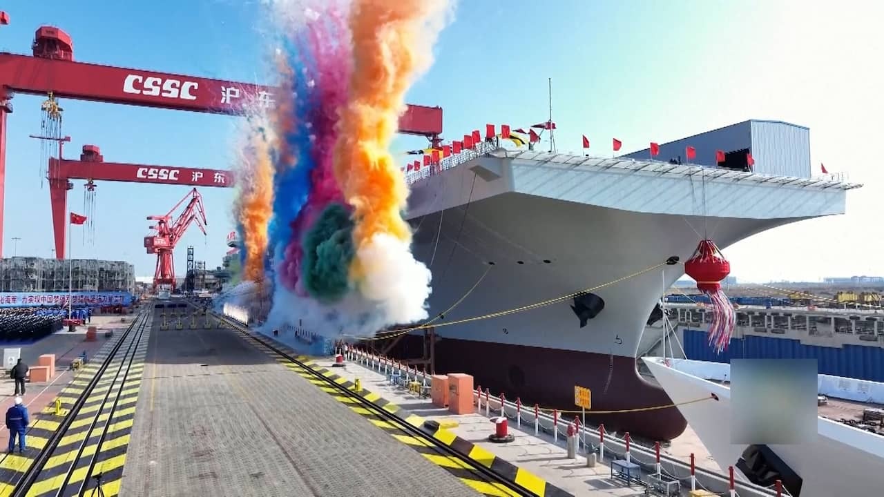 Image from Video: China baptizes huge amphibious attack ship