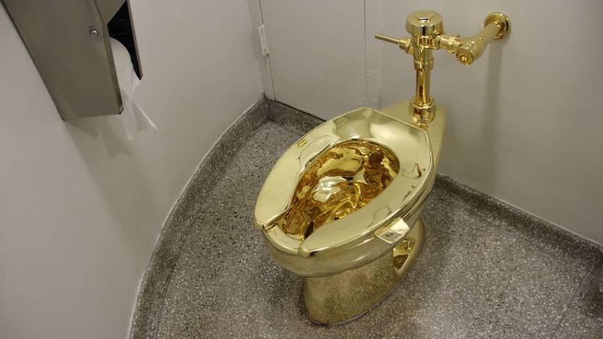 Golden toilet bowl