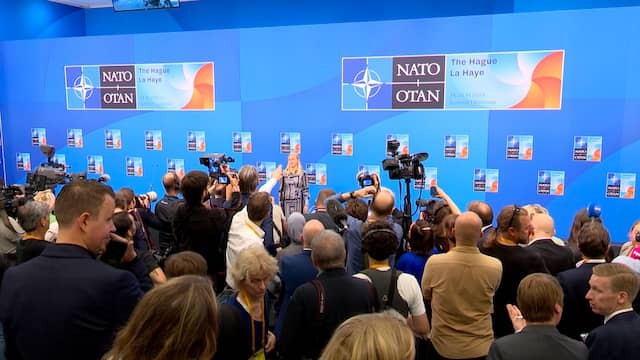 Image from Video: A Look Behind the Scenes At The Nato Summit: Pushing in Press Box Upon Arrival of World Leaders
