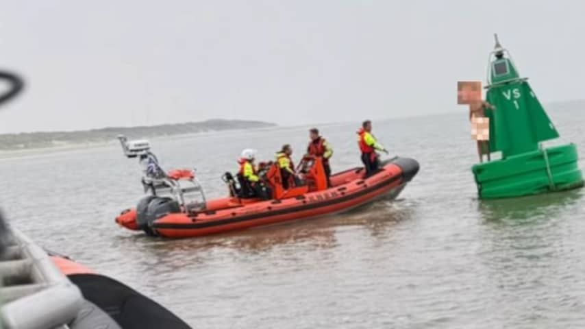 Rescue action for naked man on buoy that wanted to take morning dive at Vlieland