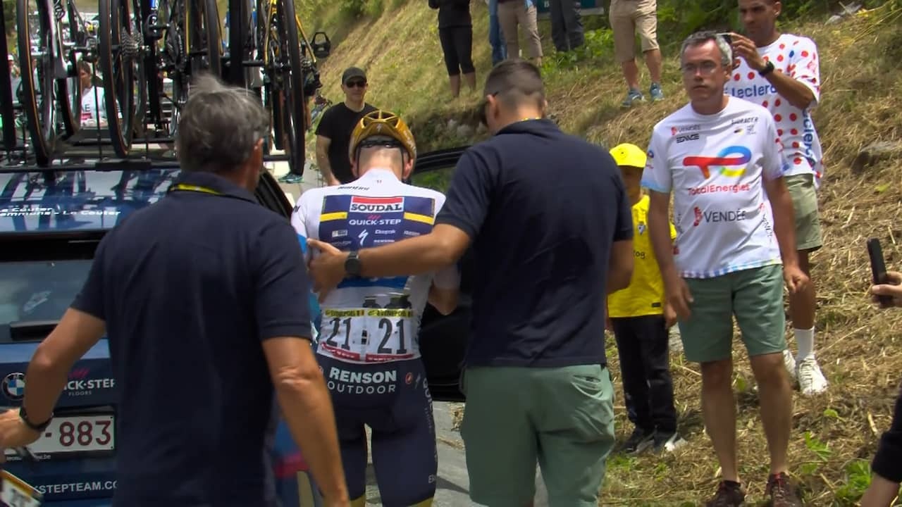Image from Video: Evenepoel Gets Into Team Leader's Car Crying After Giving Up in Tour