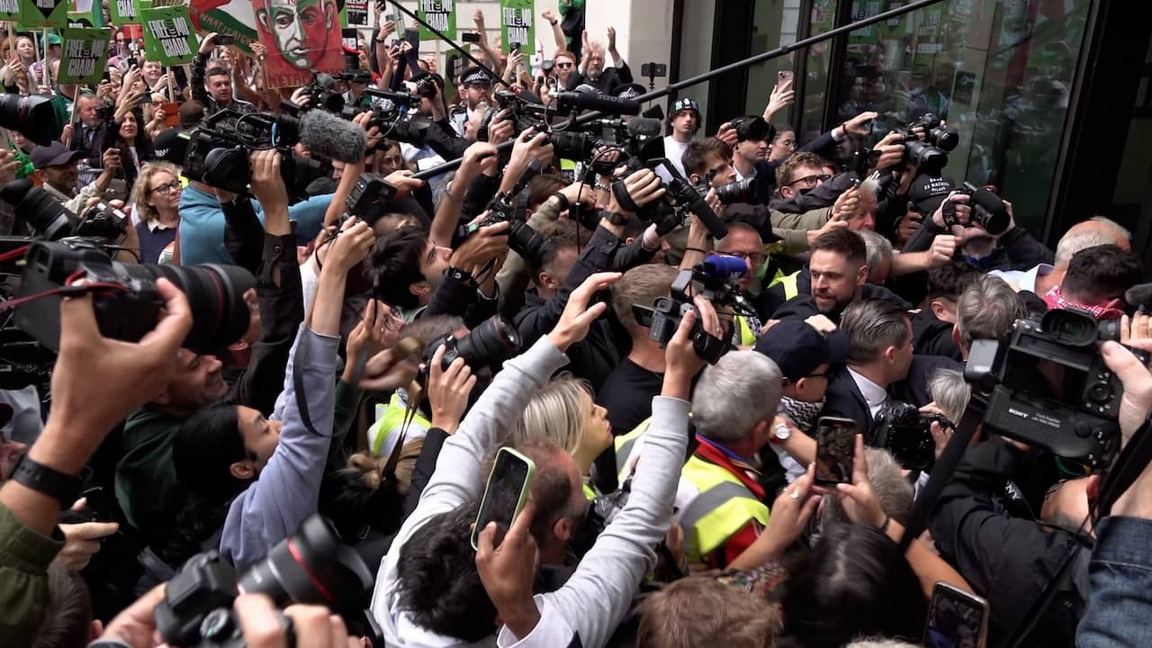 Image from Video: Kneecap member buried under the press upon arrival London arrival