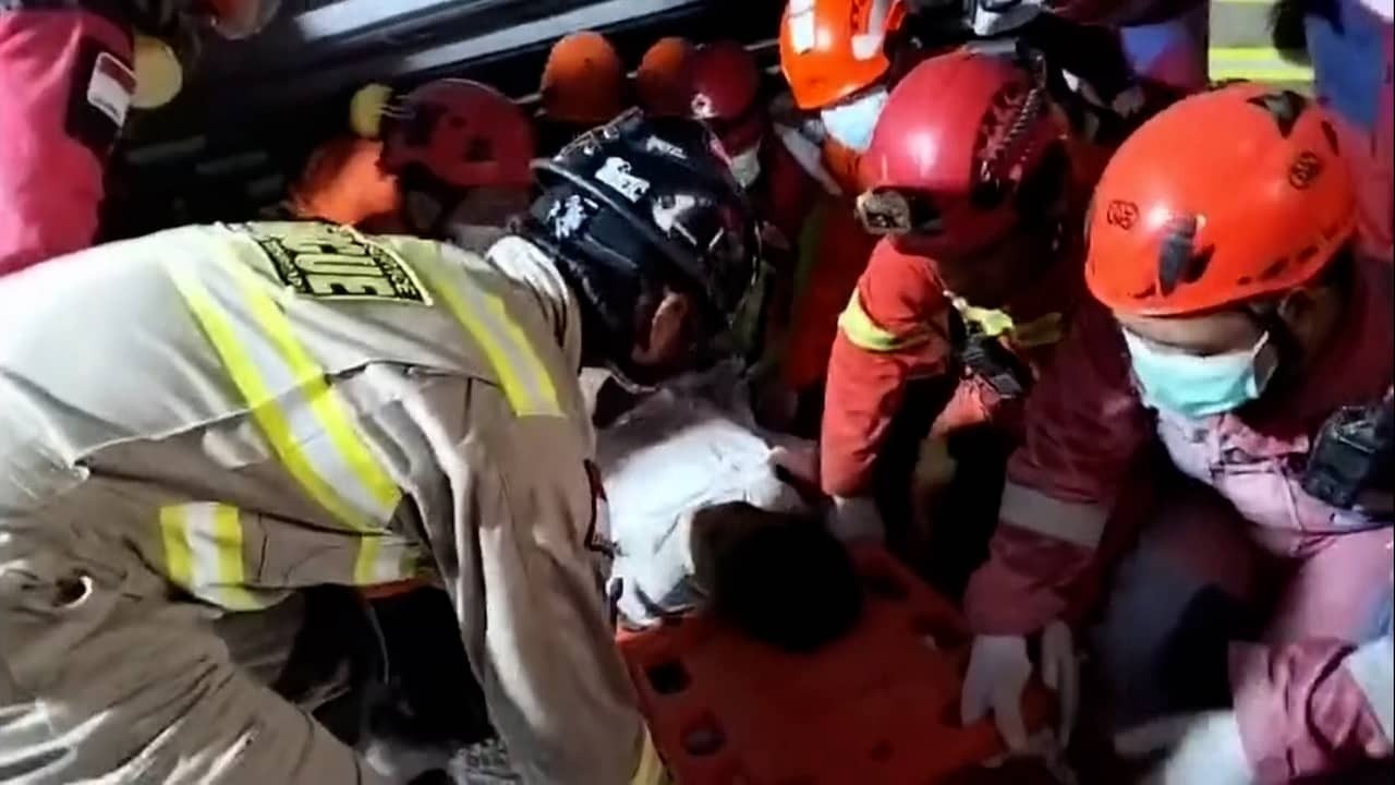 Image from Video: Rescuers Find Survivors Under Rubble in Indonesia After Two Days
